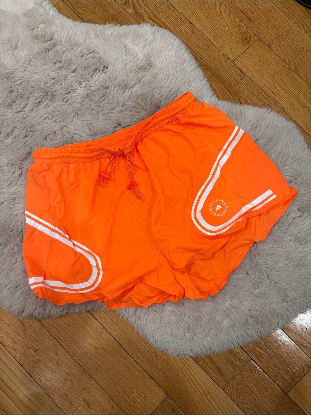 Stella McCartney Women’s Orange Athletic Shorts with Reflective Trim